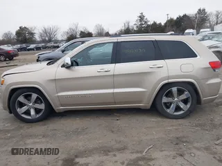 2015 Jeep Grand Cherokee Overland with VIN 1C4RJFCG5FC928085, listed as a IAAI auction lot 41540870 with 93,846 mi miles. Bid and sale history available at carsss.com. Image 14.