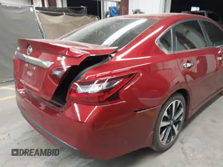 2018 Nissan Altima SR with VIN 1N4AL3AP4JC120138, listed as a IAAI auction lot 42111389 with 69,939 mi miles and . Bid and sale history available at carsss.com. Image 6.