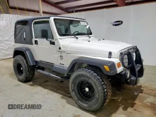 2001 Jeep Wrangler Sahara with VIN 1J4FA59S41P303519, listed as a Copart auction lot 59899545 with 238,151 mi miles and Clean title. Bid and sale history available at DreamBid. Image 4.