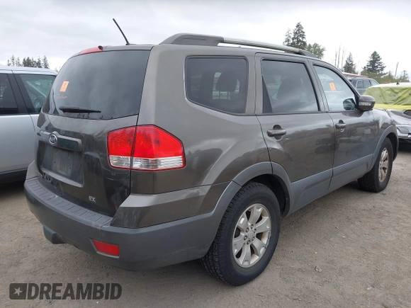2009 Kia Borrego EX with VIN KNDJH741995015542, listed as a IAAI auction lot 42120069 with 139,457 mi miles. Bid and sale history available at carsss.com. Image 4.