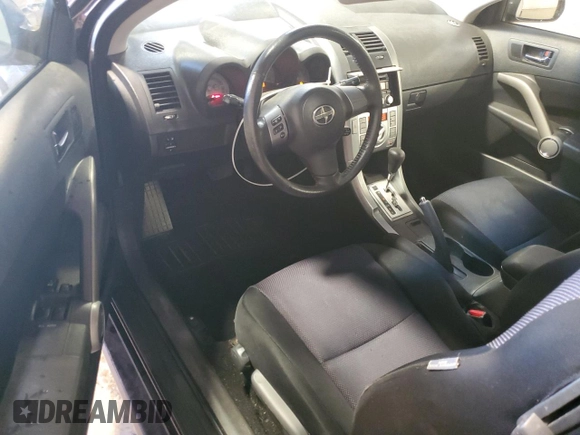 2008 Scion tC Spec with VIN JTKDE167580265188, listed as a Copart auction lot 65693115 with 156,502 mi miles and Salvage title. Bid and sale history available at DreamBid. Image 8.