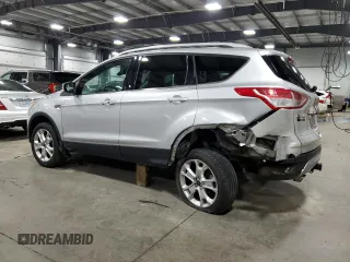 2016 Ford Escape Titanium with VIN 1FMCU9J95GUC27654, listed as a Copart auction lot 51950575 with 101,220 mi miles and Salvage Title. Bid and sale history available at carsss.com. Image 2.