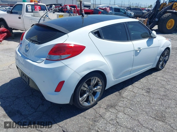 2015 Hyundai Veloster z VIN KMHTC6AD5FU231224, wystawiony jako IAAI lot #41944186 z przebiegiem 103 124 mil mil oraz . Historia ofert i sprzedaży dostępna na DreamBid. Obrazek 4.