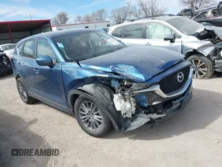 2018 Mazda CX-5 Sport with VIN JM3KFBBM8J0400741, listed as a IAAI auction lot 41860323 with 54,911 mi miles. Bid and sale history available at carsss.com. Image 1.