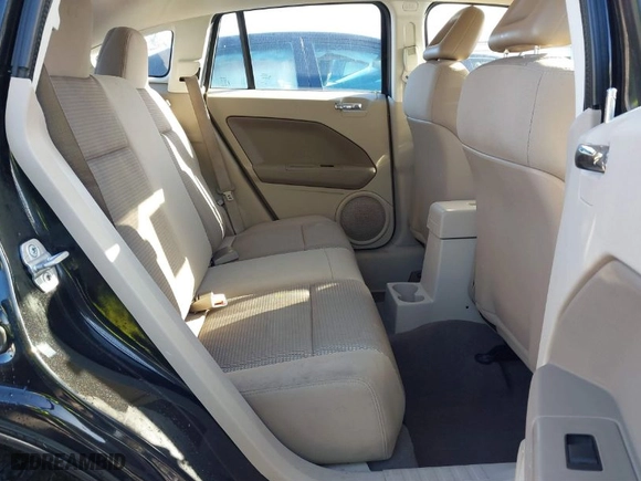 2008 Dodge Caliber SXT with VIN 1B3HB48B18D635244, listed as a IAAI auction lot 41129979 with 142,260 mi miles. Bid and sale history available at carsss.com. Image 8.