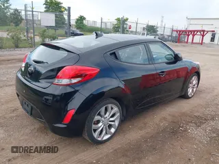 2012 Hyundai Veloster w/Gray Int with VIN KMHTC6AD6CU028810, listed as a IAAI auction lot 42818888 with 149,283 mi miles and . Bid and sale history available at DreamBid. Image 4.
