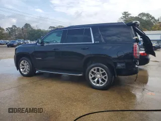 2017 GMC Yukon SLE with VIN 1GKS1AKC3HR307466, listed as a Copart auction lot 77559704 with 130,274 mi miles and Salvage Title. Bid and sale history available at carsss.com. Image 2.