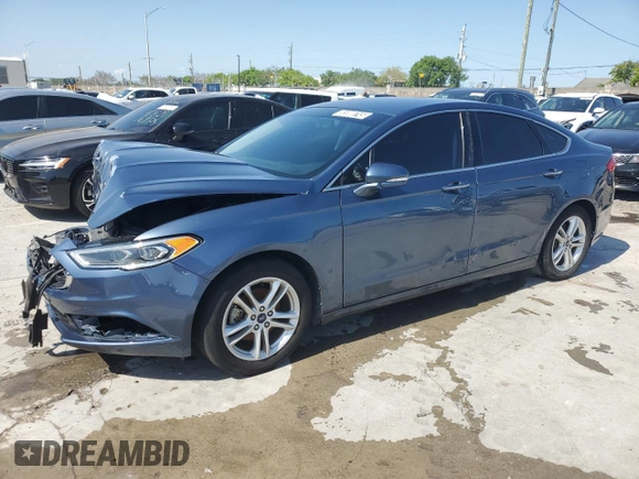 2018 Ford Fusion SE z VIN 3FA6P0HD7JR180095, wystawiony jako Copart lot #55980745 z przebiegiem 76 994 mil mil oraz Czysty tytuł • Clean title. Historia ofert i sprzedaży dostępna na DreamBid. Obrazek 1.