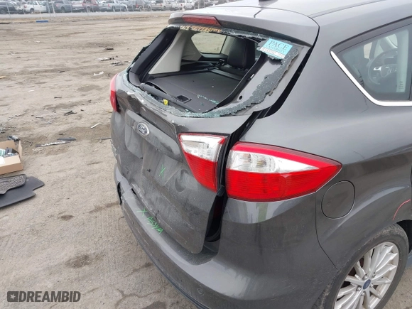 2015 Ford C-Max Energi SEL with VIN 1FADP5CU7FL121209, listed as a IAAI auction lot 41621034 with 145,648 mi miles. Bid and sale history available at carsss.com. Image 16.