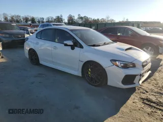 2019 Subaru WRX STI with VIN JF1VA2S68K9814059, listed as a Copart auction lot 82076004 with 72,761 mi miles and Salvage Title. Bid and sale history available at carsss.com. Image 4.