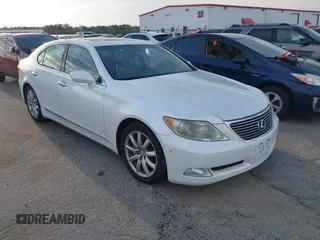 2009 Lexus LS 460 with VIN JTHCL46F095002661, listed as a IAAI auction lot 41873060 with 260,882 mi miles and . Bid and sale history available at DreamBid. Image 1.