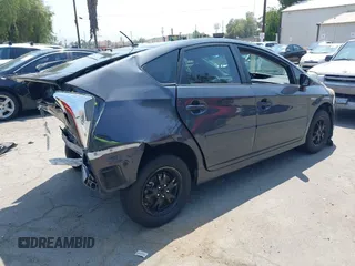 2015 Toyota Prius Four with VIN JTDKN3DU9F0473025, listed as a IAAI auction lot 42425733 with 124,196 mi miles and . Bid and sale history available at DreamBid. Image 4.