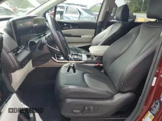 2024 Kia Carnival SX with VIN KNDNE5H37R6305573, listed as a Copart auction lot 70764084 with 23,492 mi miles and Salvage Title. Bid and sale history available at carsss.com. Image 7.