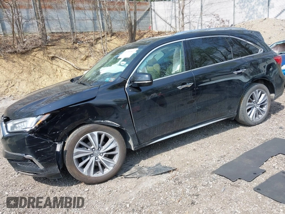 2018 Acura MDX Technology with VIN 5J8YD4H59JL005102, listed as a IAAI auction lot 42155562 with 71,890 mi miles and . Bid and sale history available at DreamBid. Image 17.