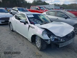 2013 Scion FR-S with VIN JF1ZNAA18D2730650, listed as a IAAI auction lot 40939089 with 156,344 mi miles. Bid and sale history available at carsss.com. Image 1.