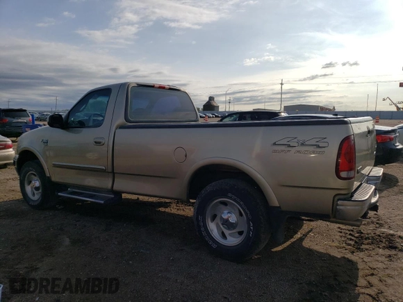 2000 Ford F-150 XL with VIN 1FTRF18L9YKA95457, listed as a Copart auction lot 67083164 with 97,988 mi miles and Salvage title. Bid and sale history available at DreamBid. Image 2.