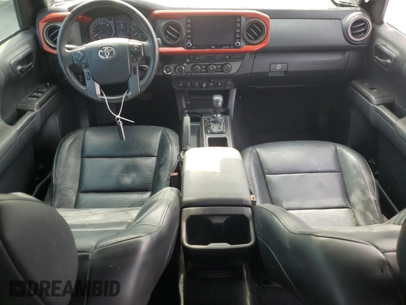 2020 Toyota Tacoma SR5 z VIN 3TYDZ5BN9LT000209, wystawiony jako Copart lot #56127875 z przebiegiem 92 350 mil mil oraz Szkoda całkowita • Salvage title. Historia ofert i sprzedaży dostępna na DreamBid. Obrazek 8.