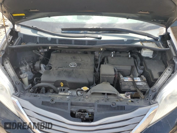 2011 Toyota Sienna XLE AAS with VIN 5TDYK3DC8BS019513, listed as a Copart auction lot 54671575 with 149,633 mi miles and Salvage Title. Bid and sale history available at DreamBid. Image 12.