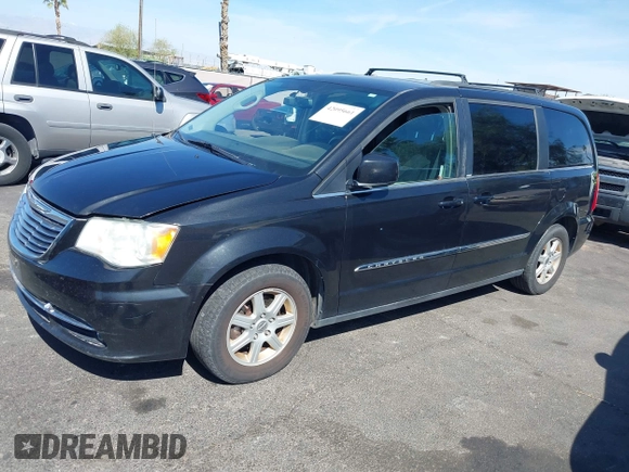 2011 Chrysler Town & Country Touring with VIN 2A4RR5DG2BR702731, listed as a IAAI auction lot 42095661 with 202,968 mi miles and . Bid and sale history available at DreamBid. Image 6.