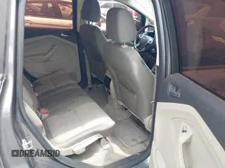 2013 Ford C-Max SE z VIN 1FADP5AU8DL556966, wystawiony jako IAAI lot #42420493 z przebiegiem 70 719 mil mil oraz . Historia ofert i sprzedaży dostępna na DreamBid. Obrazek 8.