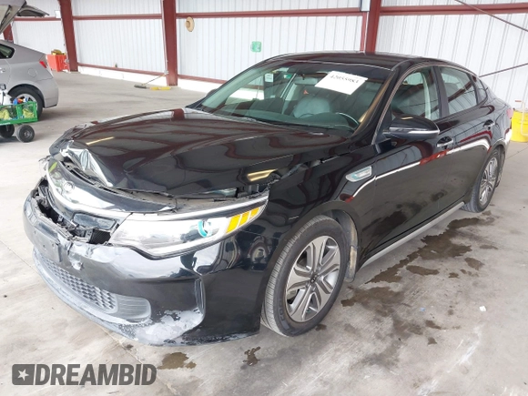 2017 Kia Optima EX with VIN KNAGU4LE5H5016627, listed as a IAAI auction lot 42055983 with 119,573 mi miles and . Bid and sale history available at DreamBid. Image 2.
