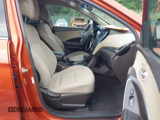 2017 Hyundai Santa Fe 2.4L z VIN 5XYZTDLB6HG451345, wystawiony jako IAAI lot #42665264 z przebiegiem 129 855 mil mil oraz . Historia ofert i sprzedaży dostępna na DreamBid. Obrazek 5.