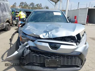 2023 Toyota Corolla Cross Hybrid S with VIN 7MUFBABG1PV014992, listed as a IAAI auction lot 42202656 with 18,913 mi miles and . Bid and sale history available at DreamBid. Image 12.