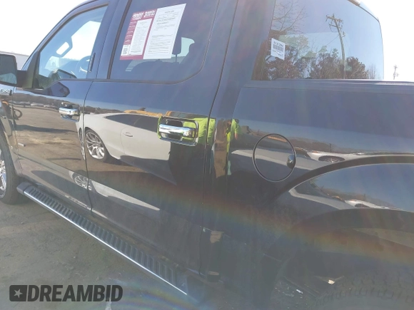 2015 Ford F-150 XLT with VIN 1FTEW1EG6FKF22211, listed as a IAAI auction lot 41753438 with 130,019 mi miles. Bid and sale history available at carsss.com. Image 14.
