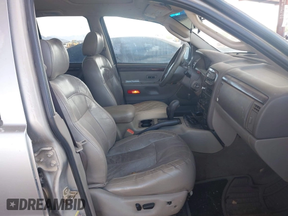 2002 Jeep Grand Cherokee Limited with VIN 1J8GW58J62C165942, listed as a IAAI auction lot 42739339 with 220,677 mi miles and . Bid and sale history available at DreamBid. Image 5.