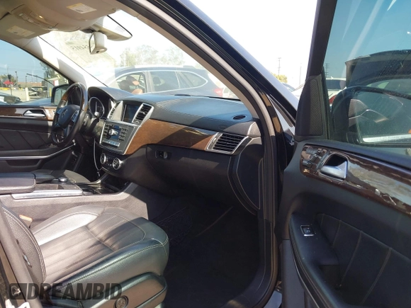 2014 Mercedes-Benz GL 450 with VIN 4JGDF7CE7EA414390, listed as a IAAI auction lot 42554915 with 114,997 mi miles and . Bid and sale history available at DreamBid. Image 5.