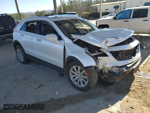 2021 Cadillac XT4 FWD Luxury с VIN 1GYAZAR47MF023407, выставлен на аукционе Copart как лот 88633325 с пробегом 77 353 миль миль и Списание • Salvage title. История ставок и продаж доступна на DreamBid. Изображение 4.