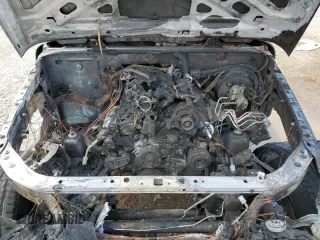 2007 Jeep Wrangler Unlimited Sahara z VIN 1J8GB59107L203053, wystawiony jako Copart lot #66549364 z przebiegiem Nie podano mil oraz Szkoda całkowita • Salvage title. Historia ofert i sprzedaży dostępna na DreamBid. Obrazek 12.
