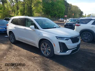 2022 Cadillac XT6 Premium Luxury z VIN 1GYKPDRS3NZ124924, wystawiony jako IAAI lot #42215418 z przebiegiem 32 368 mil mil oraz . Historia ofert i sprzedaży dostępna na DreamBid. Obrazek 1.