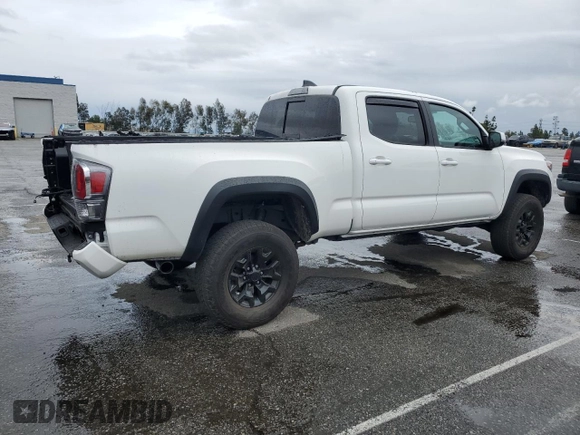 2021 Toyota Tacoma 4WD SR5 with VIN 3TMDZ5BN0MM114807, listed as a Copart auction lot 47781815 with 16,976 mi miles and Salvage Title. Bid and sale history available at carsss.com. Image 3.