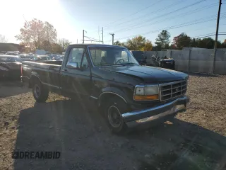 1992 Ford F-150 with VIN 1FTDF15Y9NLA29099, listed as a Copart auction lot 76238474 with 235,130 mi miles and Salvage Title. Bid and sale history available at carsss.com. Image 4.