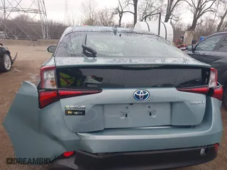 2022 Toyota Prius L Eco with VIN JTDKAMFU4N3164963, listed as a IAAI auction lot 41859931 with 5,118 mi miles. Bid and sale history available at carsss.com. Image 16.