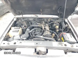 1996 Ford Ranger XL z VIN 1FTCR10A2TUD70395, wystawiony jako Copart lot #52977425 z przebiegiem 403 506 mil mil oraz Nie do naprawy. Historia ofert i sprzedaży dostępna na DreamBid. Obrazek 11.