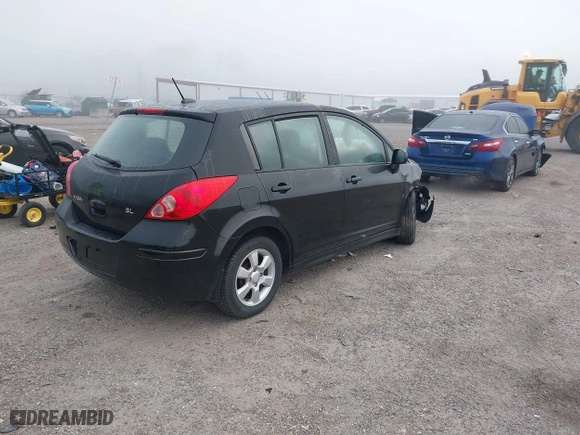 2009 Nissan Versa 1.8 S with VIN 3N1BC13E99L423269, listed as a IAAI auction lot 41490644 with 124,241 mi miles. Bid and sale history available at carsss.com. Image 4.