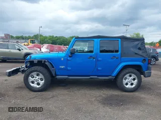 2015 Jeep Wrangler Unlimited Sahara with VIN 1C4BJWEG4FL677879, listed as a IAAI auction lot 42676097 with 85,821 mi miles and . Bid and sale history available at DreamBid. Image 14.