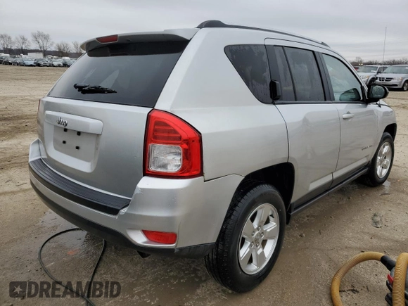 2013 Jeep Compass Sport with VIN 1C4NJCBA7DD166492, listed as a Copart auction lot 85977614 with 135,589 mi miles and Salvage Title. Bid and sale history available at carsss.com. Image 3.