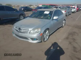 2009 Mercedes-Benz C-Class 3.5L Sport with VIN WDDGF56XX9R049848, listed as a IAAI auction lot 41263587 with 96,743 mi miles. Bid and sale history available at carsss.com. Image 2.