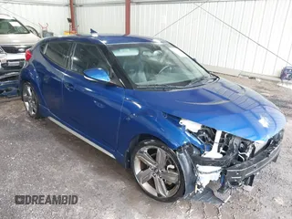 2015 Hyundai Veloster Turbo with VIN KMHTC6AE3FU241422, listed as a IAAI auction lot 42479933 with 136,814 mi miles and . Bid and sale history available at DreamBid. Image 1.