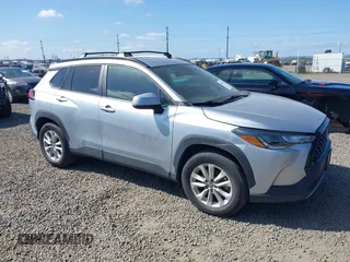 2022 Toyota Corolla Cross LE with VIN 7MUCAABG1NV021010, listed as a IAAI auction lot 42082415 with 30,395 mi miles and . Bid and sale history available at DreamBid. Image 1.