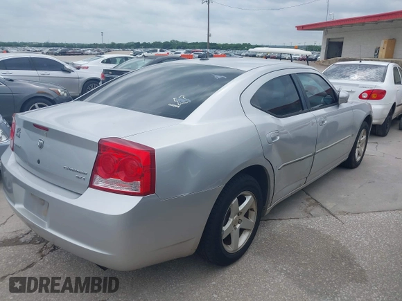 2010 Dodge Charger SXT with VIN 2B3CA3CV2AH227658, listed as a IAAI auction lot 42101656 with 162,392 mi miles. Bid and sale history available at carsss.com. Image 4.