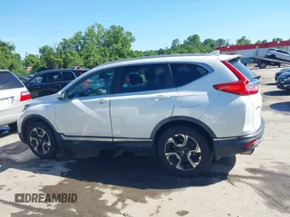 2019 Honda CR-V Touring с VIN JHLRW2H98KX003911, выставлен на аукционе IAAI как лот 42306400 с пробегом 105 780 миль миль и . История ставок и продаж доступна на DreamBid. Изображение 14.