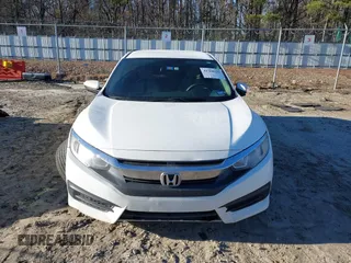 2017 Honda Civic LX z VIN 19XFC2F50HE007646, wystawiony jako IAAI lot #41360121 z przebiegiem 133 800 mil mil oraz . Historia ofert i sprzedaży dostępna na DreamBid. Obrazek 12.