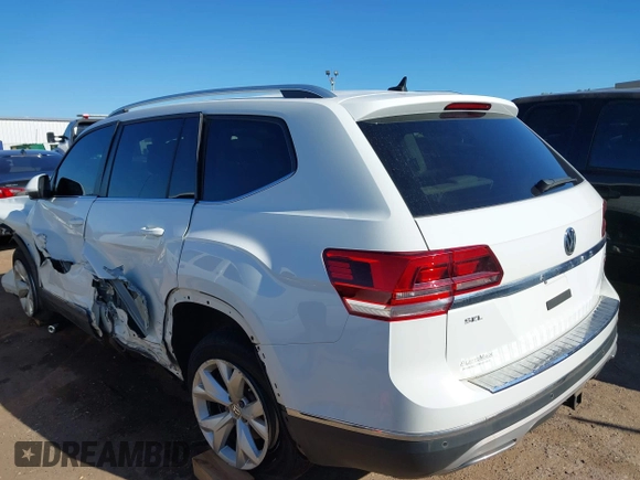 2018 Volkswagen Atlas SEL z VIN 1V2MR2CA3JC536009, wystawiony jako IAAI lot #40205798 z przebiegiem 125 945 mil mil oraz . Historia ofert i sprzedaży dostępna na DreamBid. Obrazek 3.