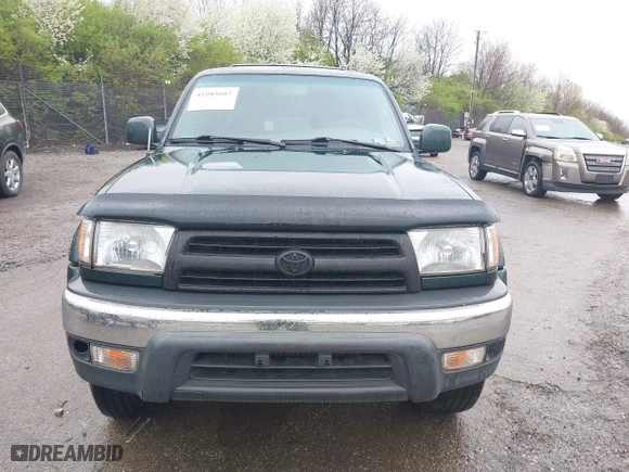 2000 Toyota 4Runner SR5 with VIN JT3HN86R9Y0294975, listed as a IAAI auction lot 41985007 with 218,761 mi miles. Bid and sale history available at carsss.com. Image 6.