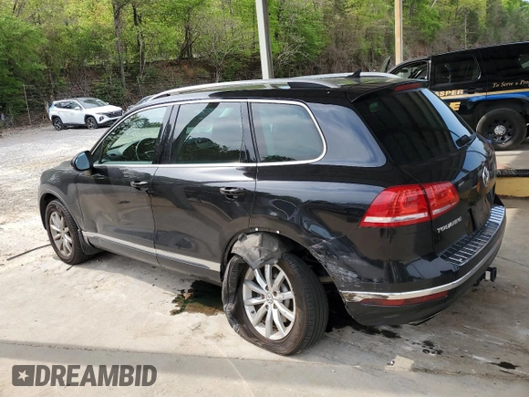 2016 Volkswagen Touareg Sport with VIN WVGEF9BP3GD007543, listed as a Copart auction lot 52806715 with 121,404 mi miles and Salvage Title. Bid and sale history available at DreamBid. Image 2.
