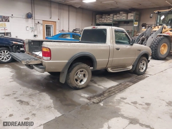1999 Ford Ranger XLT with VIN 1FTYR11X0XTA72917, listed as a IAAI auction lot 41502156 with 106,585 mi miles. Bid and sale history available at carsss.com. Image 4.
